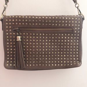 Studded crossbody purse.
